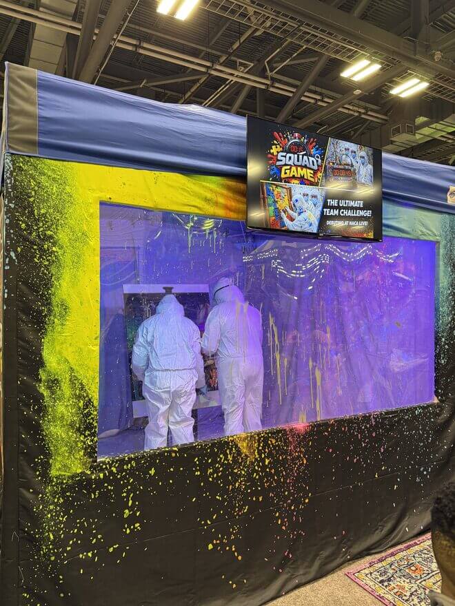 The Axecessive Force Squad Game arena with its team challenge banner at NACA Live