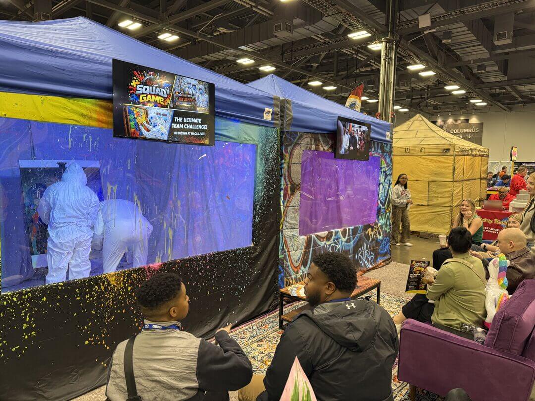 Crowd watching a squad compete inside the Axecessive Force Squad Game arena